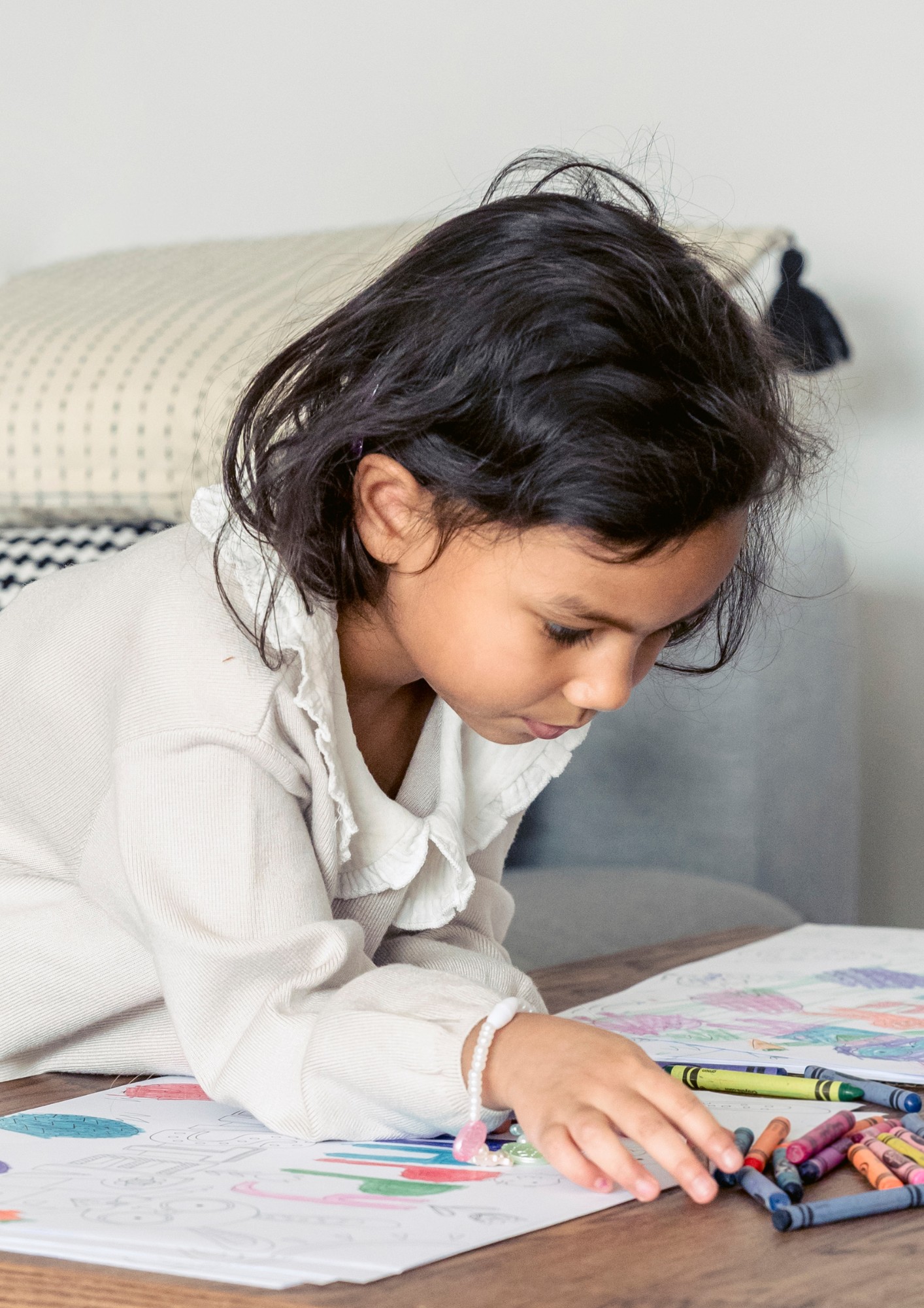A girl colors