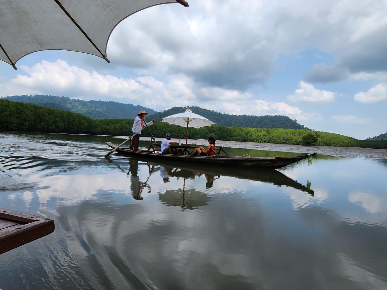 People on a small boat in Koh Chang