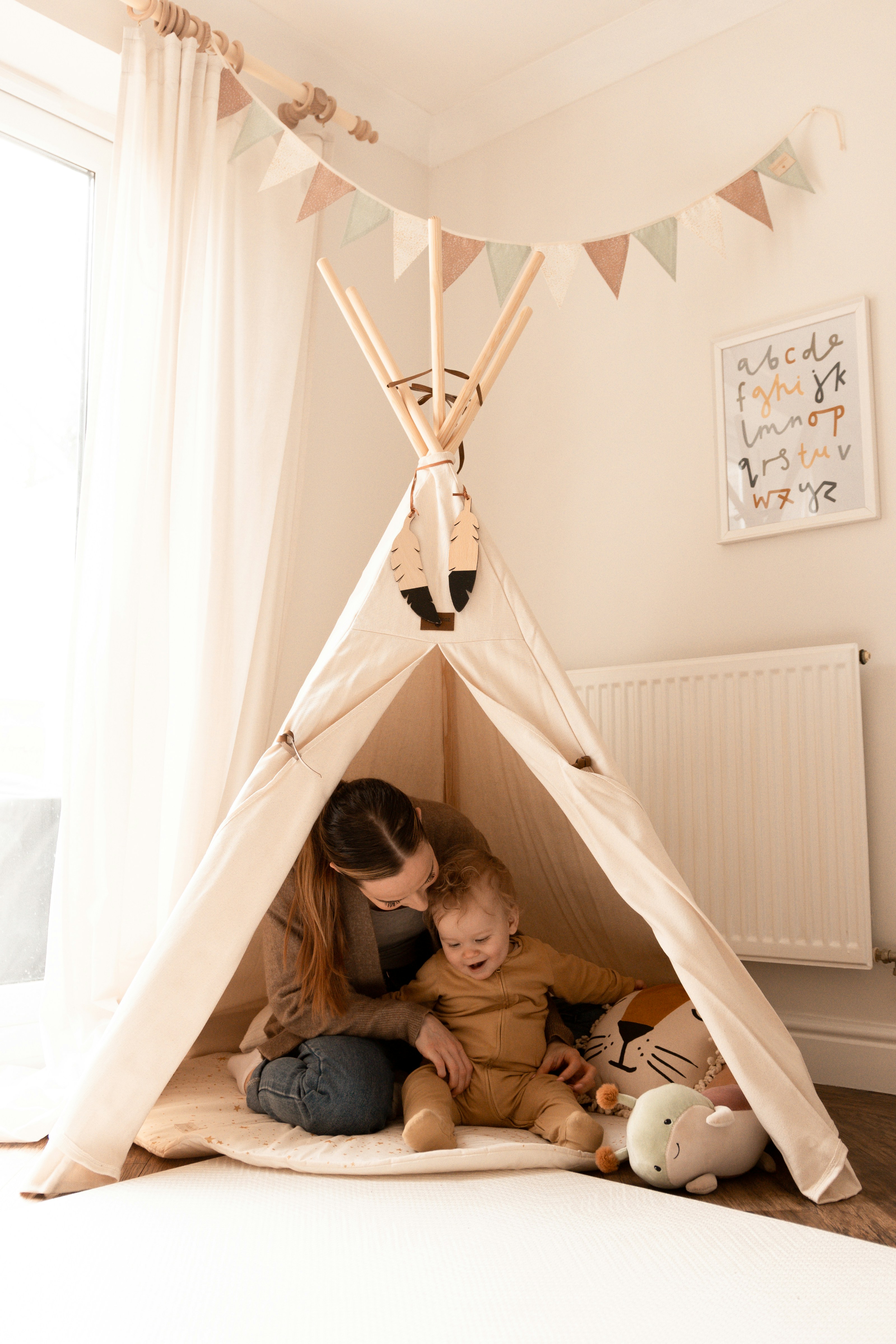 A mother and daughter in a tent