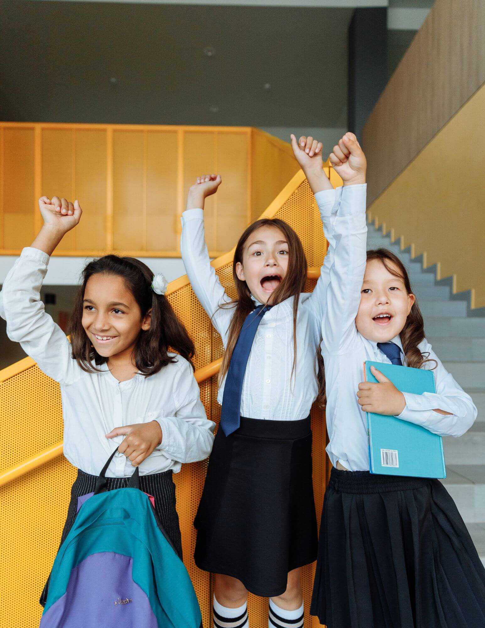 A groups of school children smiling