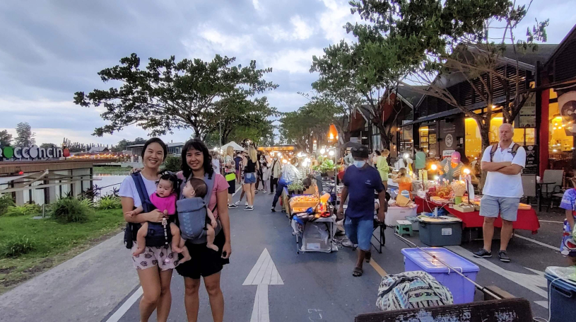 Exploring a Thai outdoor market with a friend