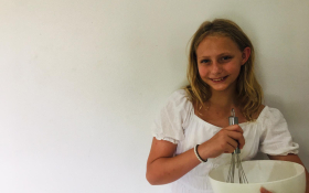 A white girl makes oat and banana superpower muffins