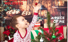 Front cover of BAMBI magazine. A small boy reaches for a Christmas decoration.