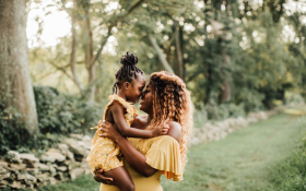 A mother and daughter hug