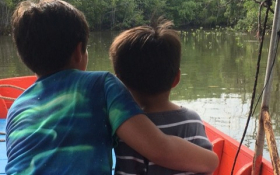 Two boys in a boat