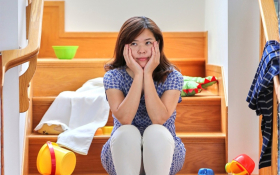 A child sits on the stairs