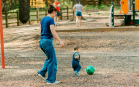 A family play in the playground