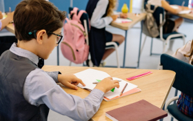 A boy at a desk