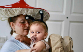 A mother and daughter in Halloween costumes